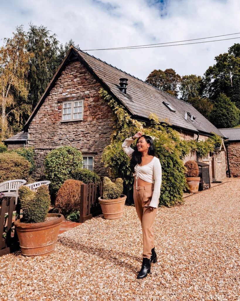 Dejashuu outside Tudor Farm House